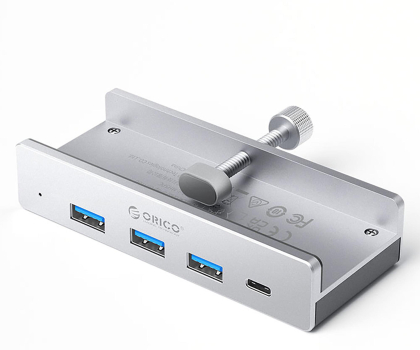 Hub USB Orico USB-C - 3x USB-A 3.0, USB-C 3.0 - srebrny (na zacisk, do biu